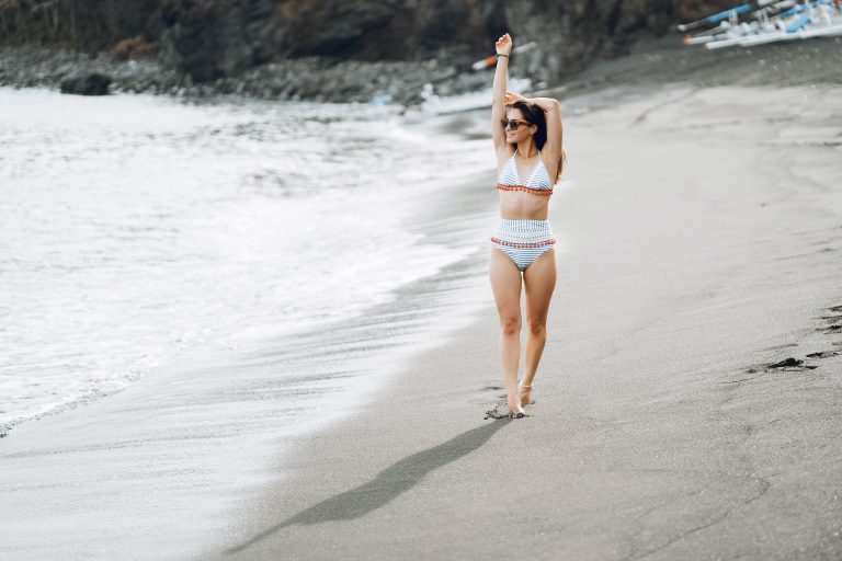 some-one-jogging-on-a-beach-scaled