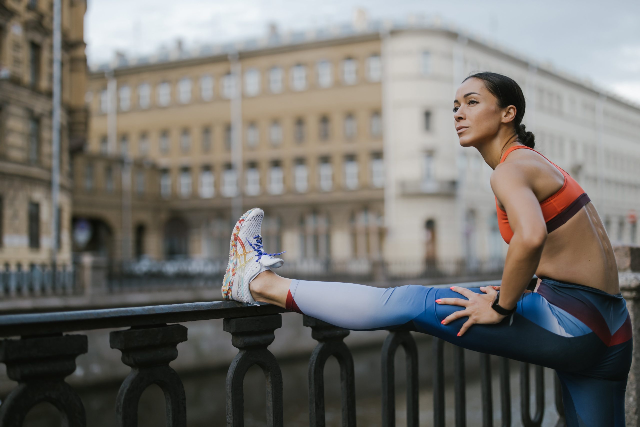 Person resting and stretching after a workout